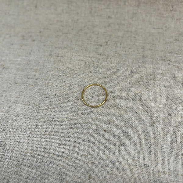 E246 - Bague Cross Line ronde