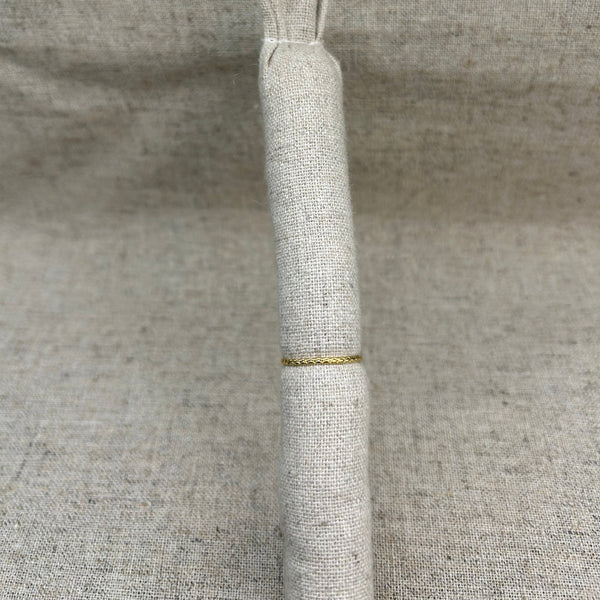 E246 - Bague Cross Line ronde