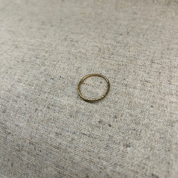 E248 - Bague Cross Line ronde